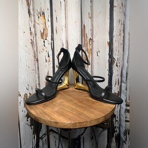 Chic Black and Gold Strappy Heels